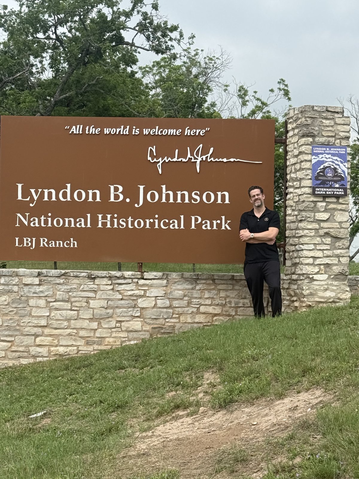 Dr. Kevin Christensen at the entrance sign to the Lyndon B. Johnson National Historical Park, LBJ Ranch.